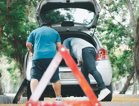 asian-man-find-tools-car-car-repair-after-car-breakdown-street-1